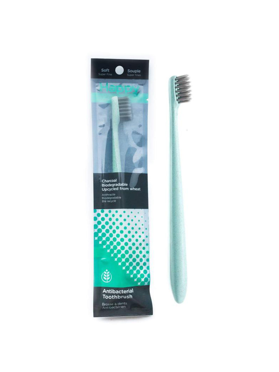 happy biodegradable charcoal toothbrush